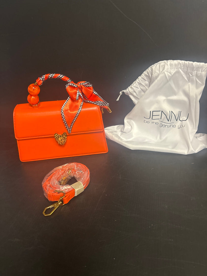 Orange Vegan clutch with pear and ribbon handle