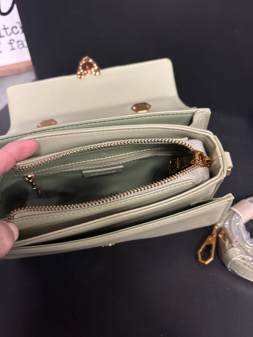Mint Green Clutch with a pearl and ribbon handle