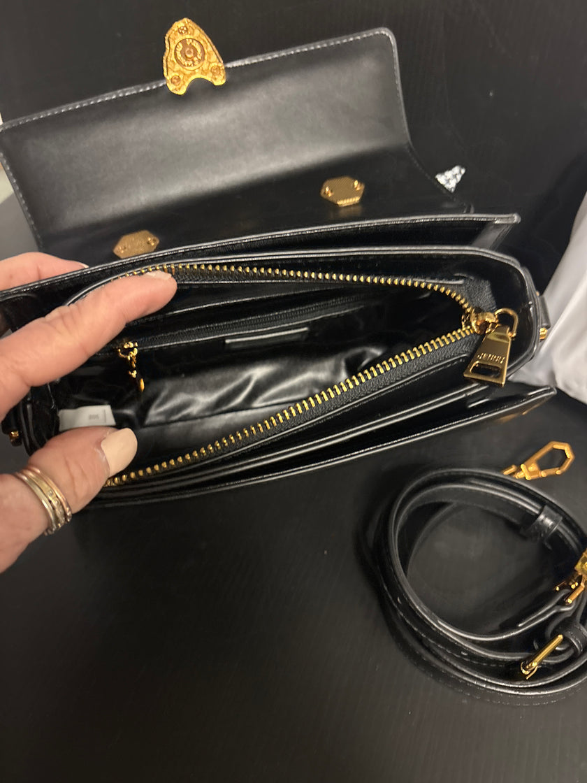 Black Vegan clutch with pear and ribbon handle
