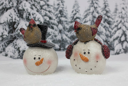Snowman head with cardinal