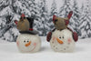 Snowman head with cardinal
