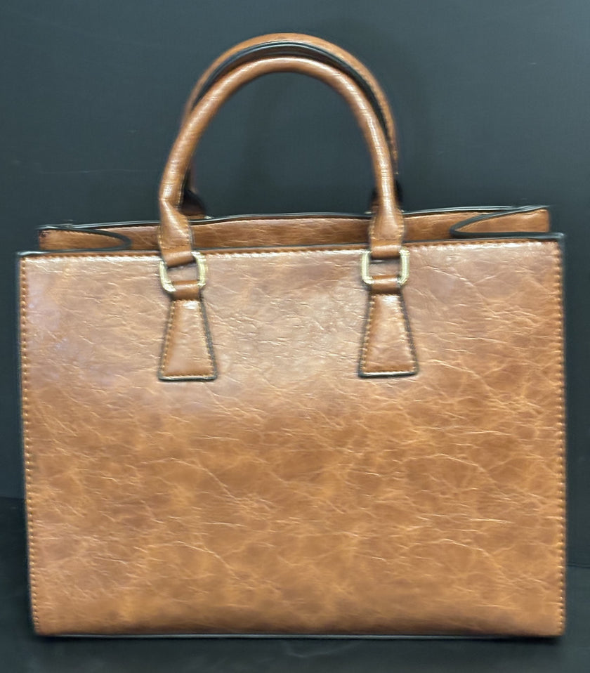 Vegan handbag with embossed floral design