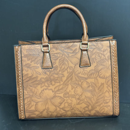 Vegan handbag with embossed floral design