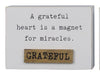 Wooded tabletop with inspirational sayings