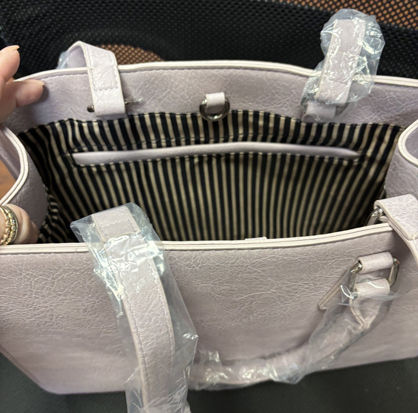 Vegan handbag with embossed floral design