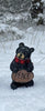 Resin Black Bear holding message sign