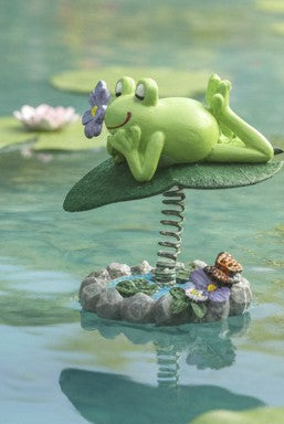 Leap into spring frog figurine