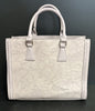 Vegan handbag with embossed floral design