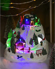 Skiing Children LED Illuminated Musical Snowy Mountain with Spinning Action